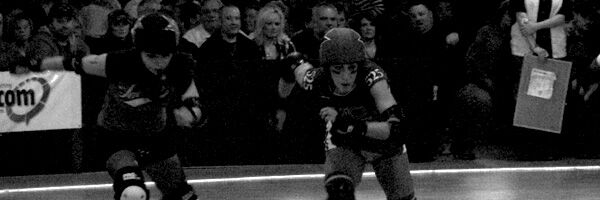 Jammers skating through the pivots and blockers … Queen City Roller Girls
